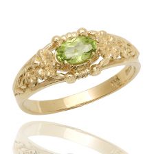 טבעת זהב משובצת פרידוט